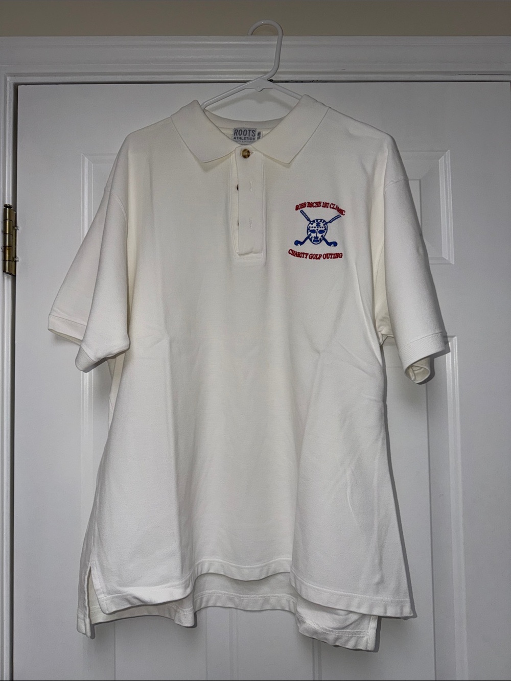Roots Men's Off-White Polo with Embroidered “Robb Esche”